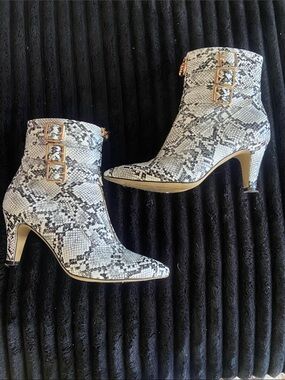 IDIFU White and Black Snake-Print Pointed Ankle Booties with Gold Buckles